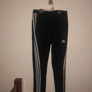 Black and white soccer sweatpants.